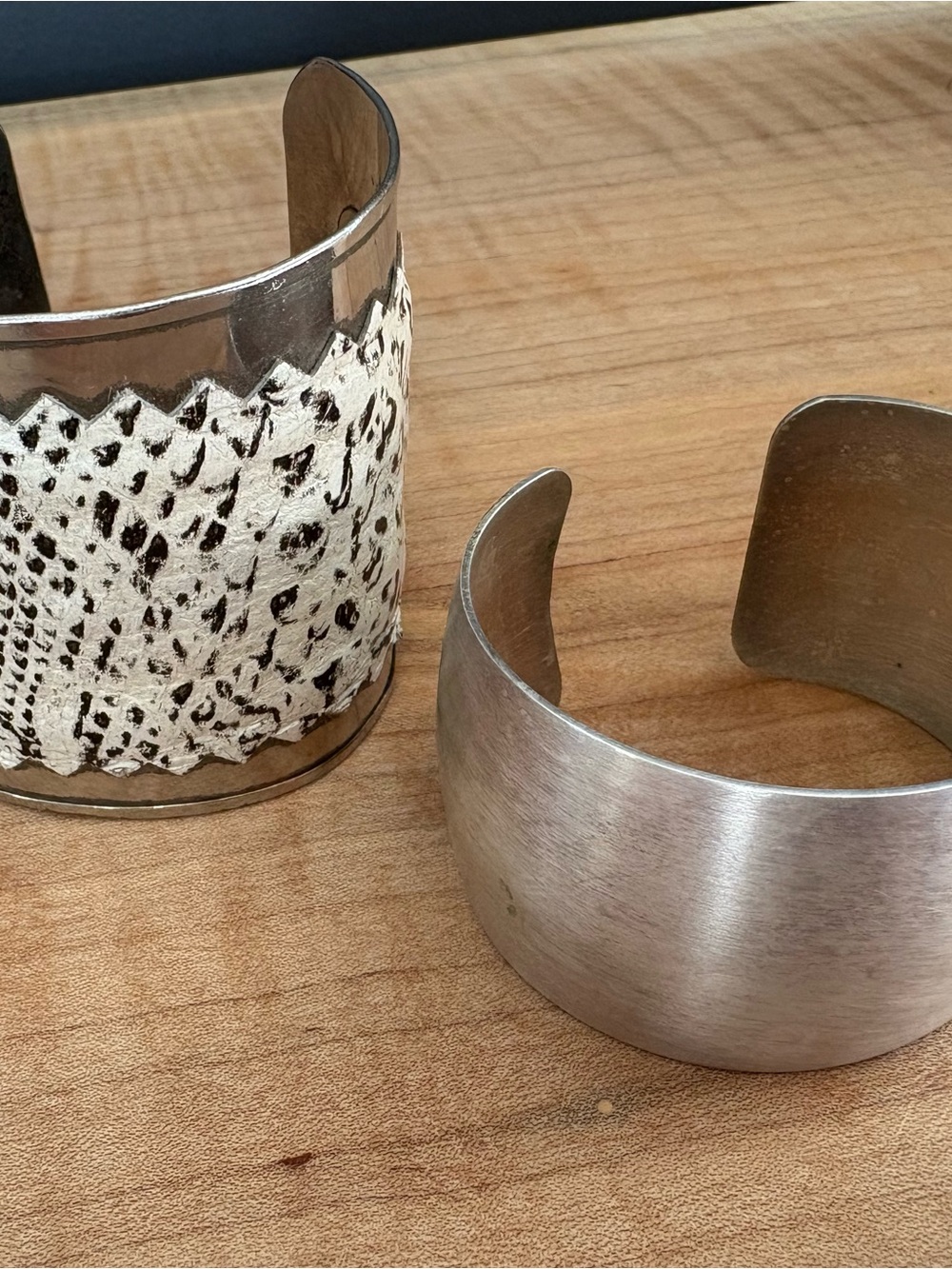 Set of 2 SilverTone Wide Cuff Bracelets Textured White Leather  Accent